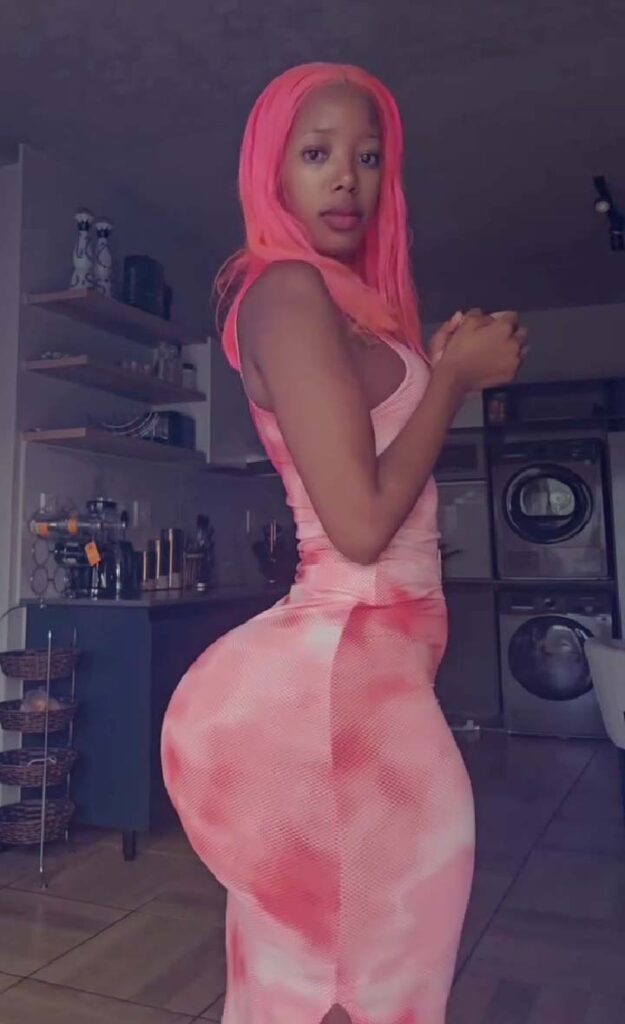 Slim Thick black girl in pink dress