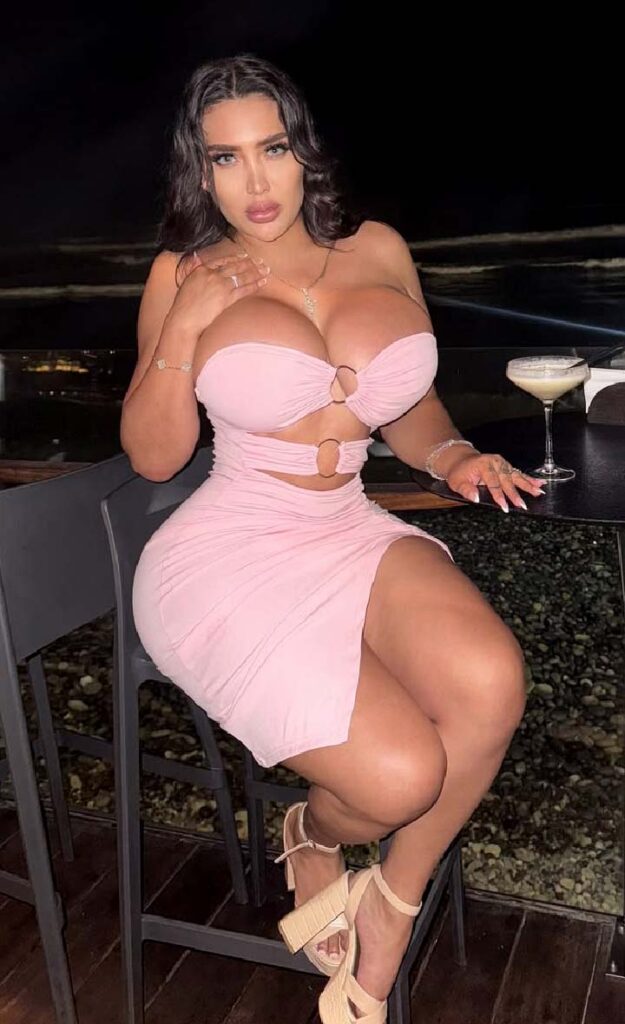 Curvy Latina Model in pink dress